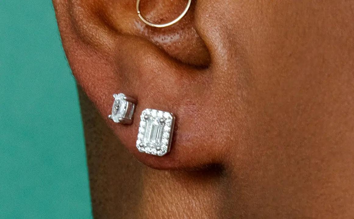Two diamond pave pod earrings