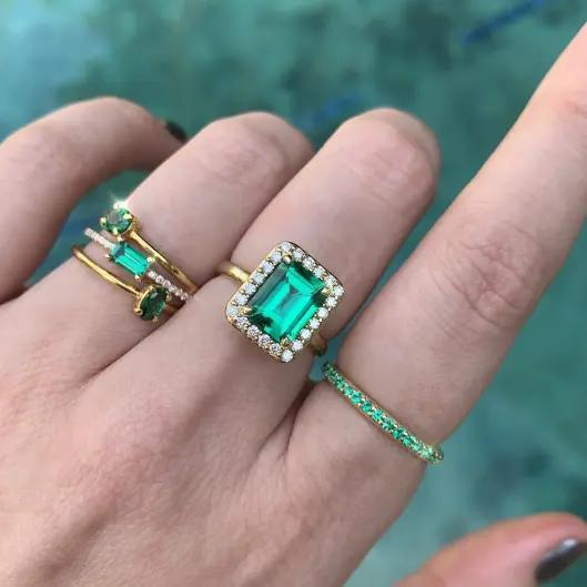 Fine halo emerald ring